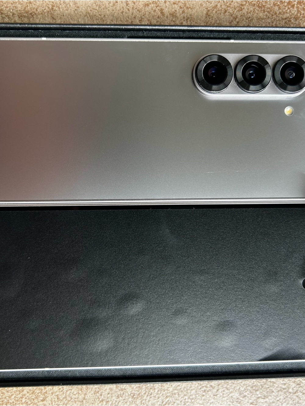 Silver Android Smartphone with Triple Camera
